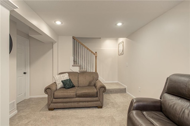 living area with carpet flooring, recessed lighting, stairway, and baseboards