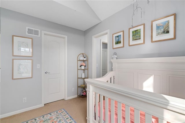 bedroom featuring baseboards, visible vents, and carpet floors