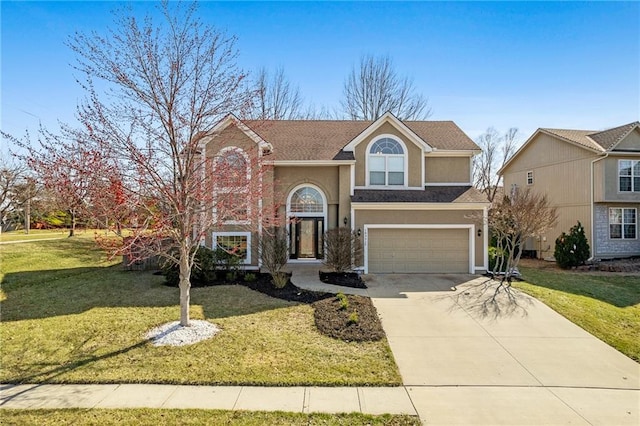 traditional-style home with a front yard, an attached garage, a shingled roof, stucco siding, and concrete driveway