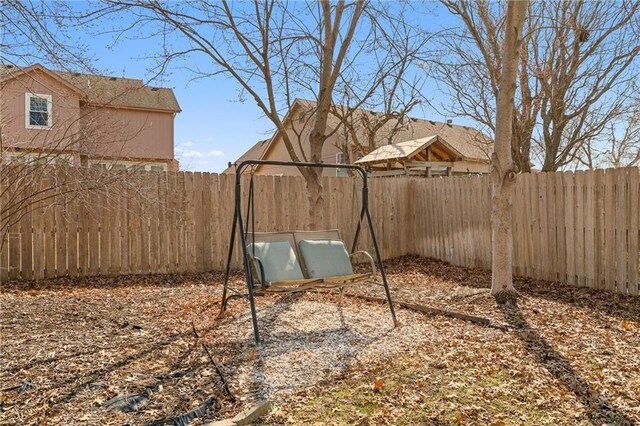 view of yard with a fenced backyard