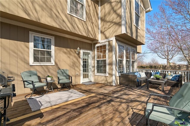 wooden deck with outdoor lounge area