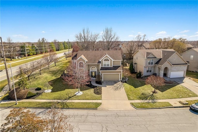 view of front of home featuring stucco siding, an attached garage, concrete driveway, and a front lawn