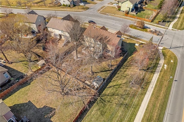 birds eye view of property with a residential view