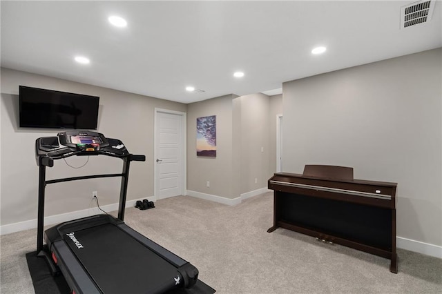 workout area featuring visible vents, baseboards, recessed lighting, and carpet floors