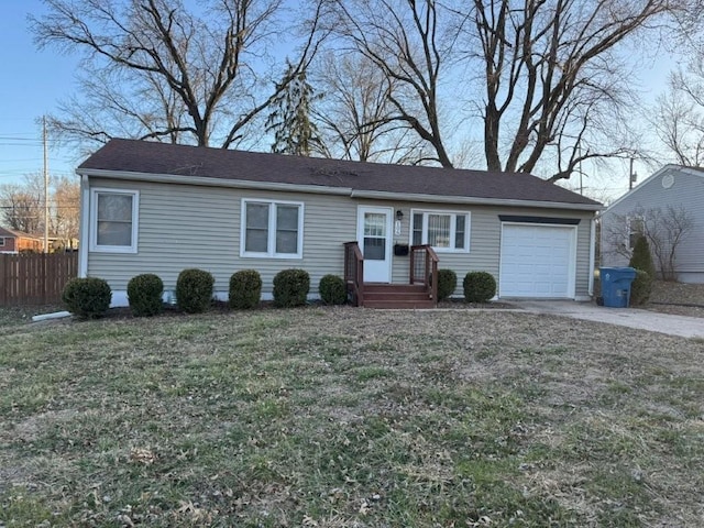 single story home featuring a garage, concrete driveway, a front yard, and fence