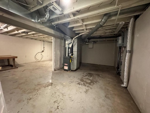 unfinished basement with heating unit