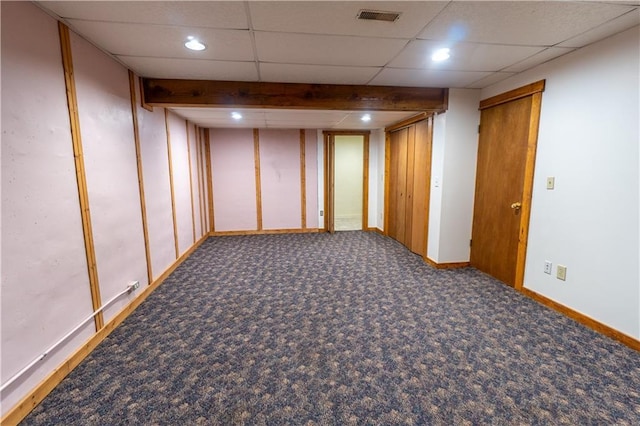 finished basement featuring carpet, visible vents, baseboards, recessed lighting, and a drop ceiling