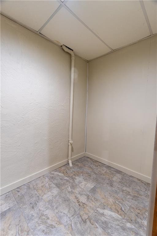 empty room with baseboards