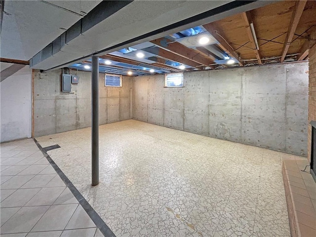 basement featuring electric panel