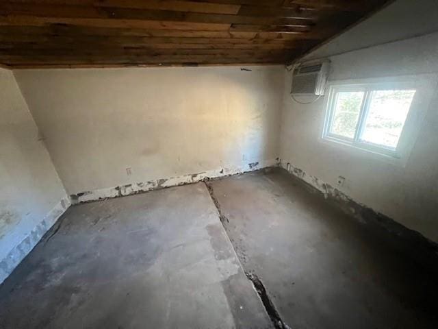 basement featuring a wall unit AC