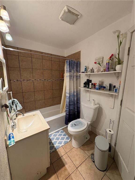 full bathroom featuring vanity, shower / bathtub combination with curtain, visible vents, tile patterned floors, and toilet