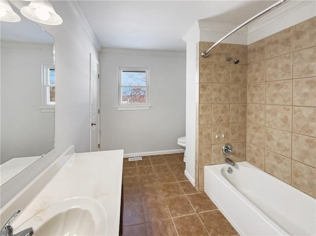 full bathroom with baseboards, toilet, shower / tub combination, ornamental molding, and tile patterned floors