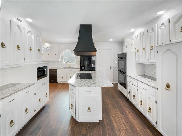 kitchen featuring island range hood, dark wood finished floors, black appliances, white cabinets, and a center island