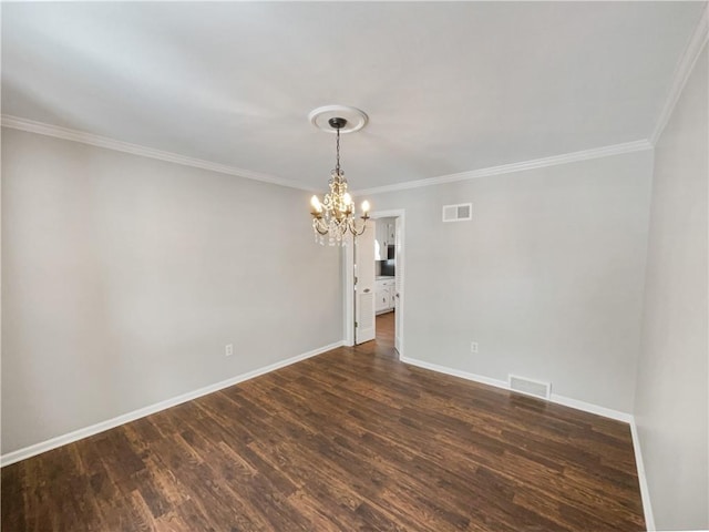 empty room with dark wood-style floors, visible vents, and baseboards