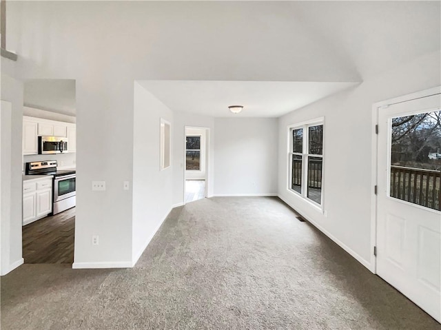 interior space featuring baseboards