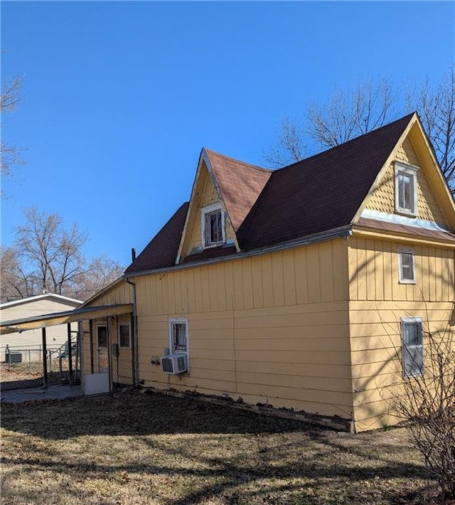 view of home's exterior featuring cooling unit