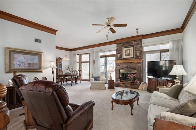 living area featuring visible vents, ornamental molding, and carpet floors