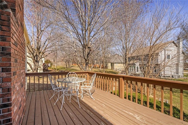 deck with outdoor dining space