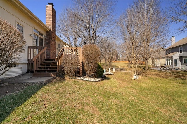 view of yard featuring a deck