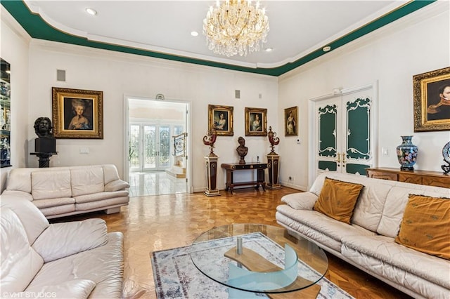 living room with baseboards, recessed lighting, ornamental molding, french doors, and a chandelier