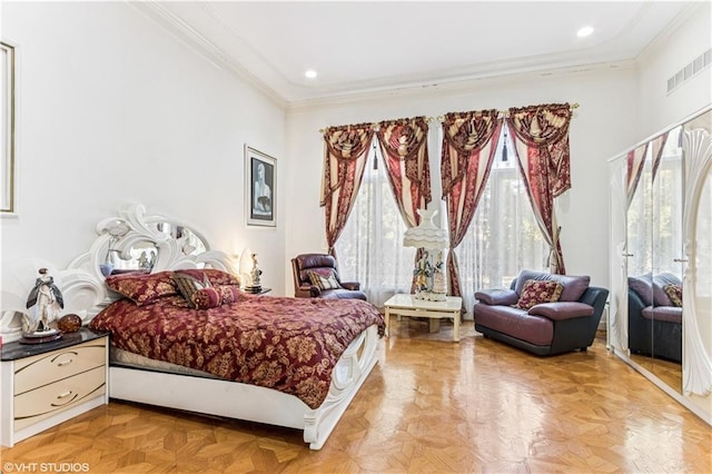 bedroom with visible vents, recessed lighting, and ornamental molding