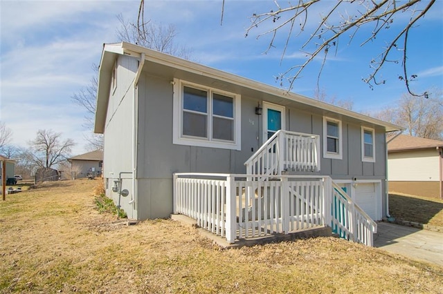 view of front of property with concrete driveway and an attached garage