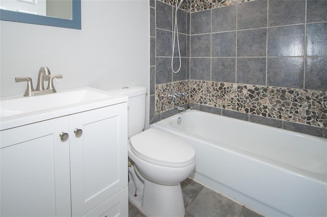 bathroom featuring vanity, toilet, and tub / shower combination