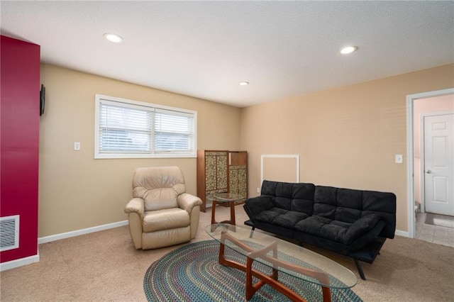 living room with visible vents, recessed lighting, carpet, and baseboards