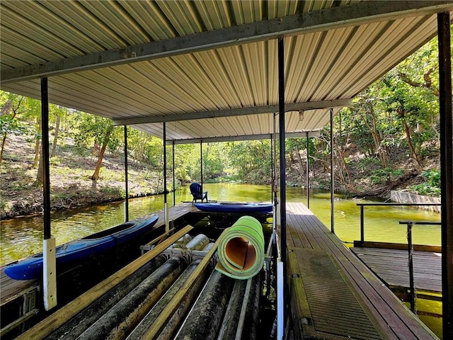 dock area featuring a water view