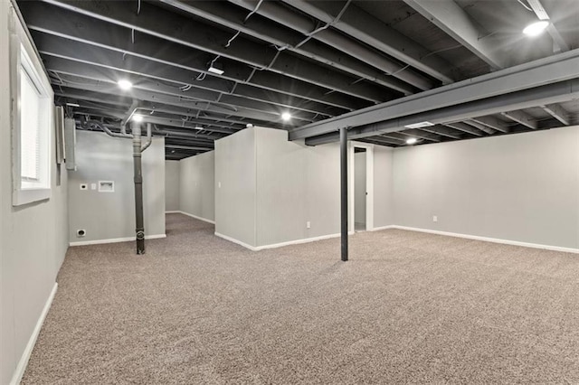 basement with carpet and baseboards