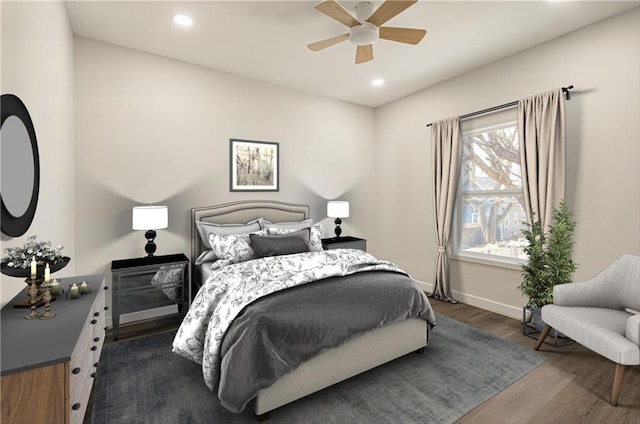 bedroom featuring dark wood finished floors, recessed lighting, baseboards, and ceiling fan