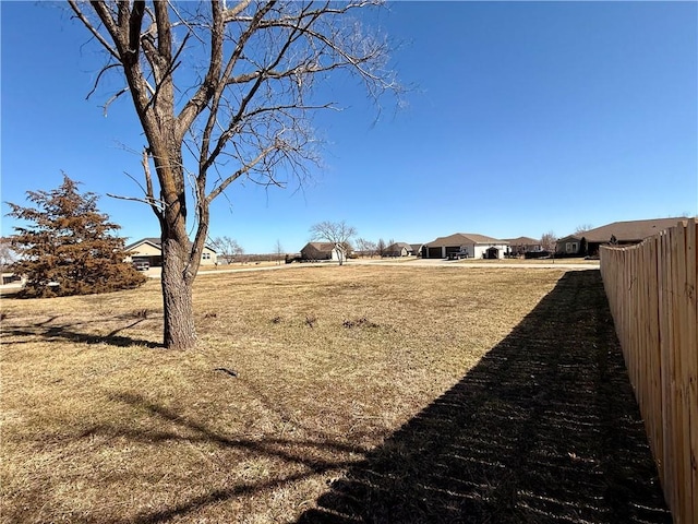 view of yard with fence