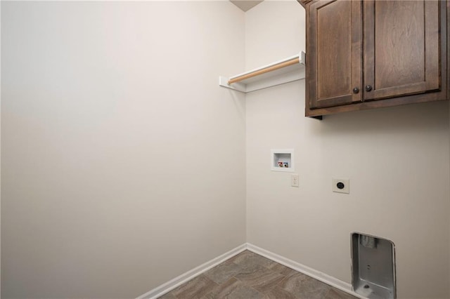 laundry area with cabinet space, hookup for an electric dryer, baseboards, and washer hookup