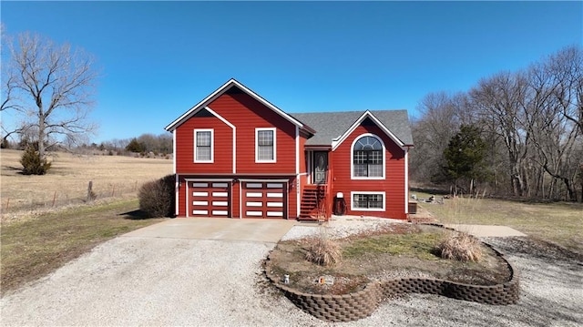 view of front of home featuring an attached garage and driveway