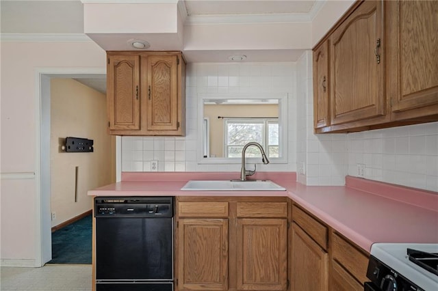 kitchen featuring crown molding, white range with gas stovetop, light countertops, black dishwasher, and a sink