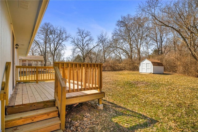 view of yard featuring a shed, a wooden deck, and an outdoor structure