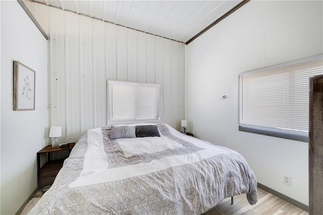 bedroom with wood finished floors