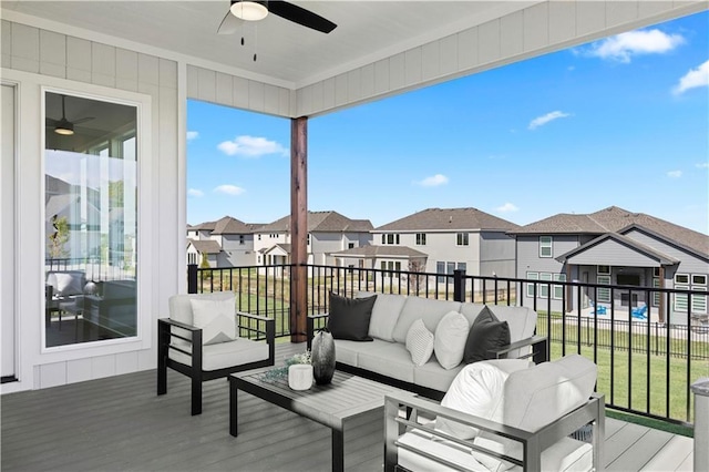 8017 Round Prairie St, Shawnee, KS 66220 - wooden deck with ceiling fan, a residential view, and an outdoor living space