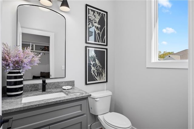 8017 Round Prairie St, Shawnee, KS 66220 - bathroom featuring toilet and vanity