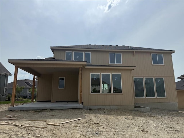 8017 Round Prairie St, Shawnee, KS 66220 - back of house with a patio area