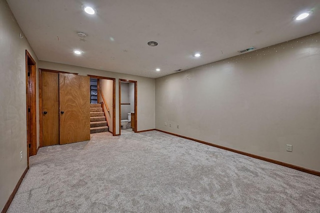 unfurnished bedroom featuring visible vents, recessed lighting, baseboards, and carpet