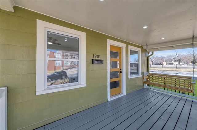 wooden terrace with a porch