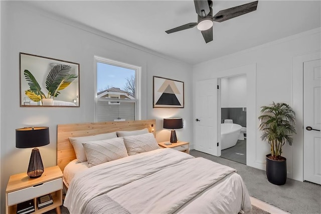 carpeted bedroom featuring ceiling fan and crown molding