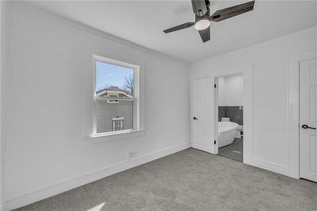 unfurnished bedroom featuring baseboards, ceiling fan, and carpet flooring