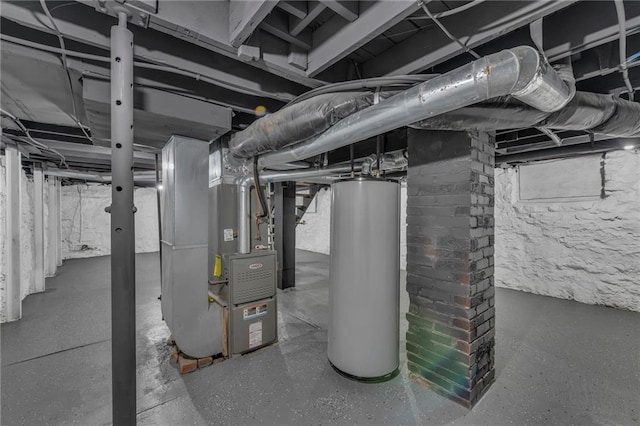 utility room with heating unit and water heater