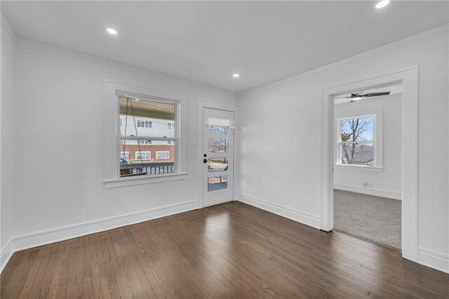 1901 E 79th St, Kansas City, MO 64132 - unfurnished room featuring dark wood finished floors, recessed lighting, baseboards, and ornamental molding