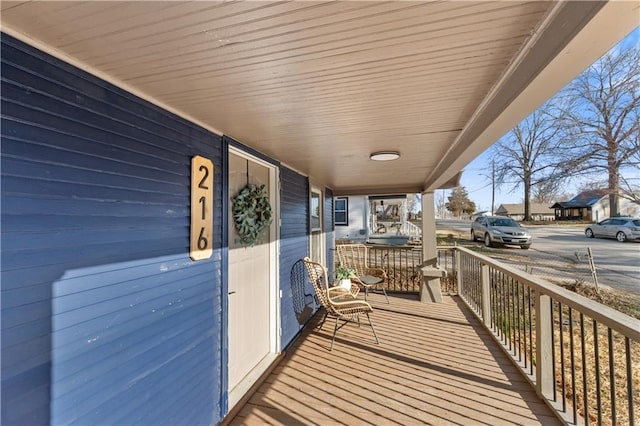 wooden deck featuring a porch