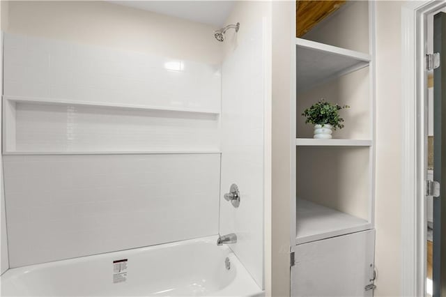 bathroom featuring  shower combination