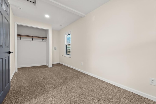 unfurnished bedroom with recessed lighting, a closet, baseboards, and carpet