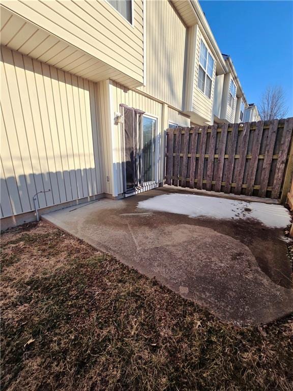 exterior space with a patio area and fence